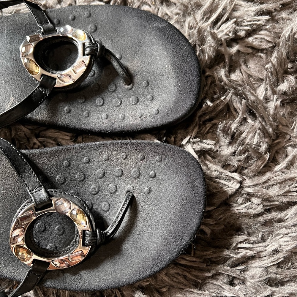 Black sandals with chrome and clear gems